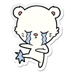 sticker of a crying cartoon polar bear kicking out