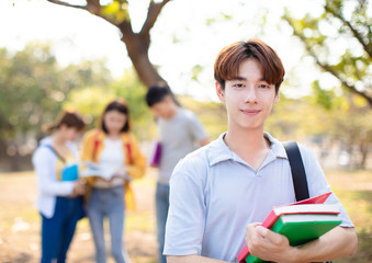 portrait of  Asian college student on campus