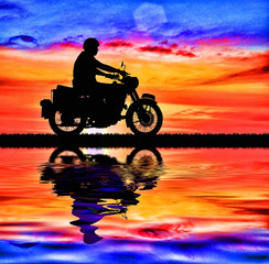 Obraz na płótnie Canvas Silhouette biker with his motorbike beside the natural lake and beautiful sunset sky.oil painting