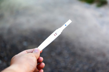 Man holding pregnancy test, New life and new family concept