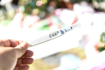 Man holding pregnancy test, New life and new family concept