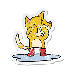 distressed sticker of a laughing fox in a puddle