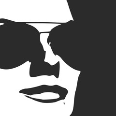 Portrait of beautiful woman in black sunglasses.