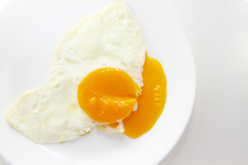 Egg background / chicken egg yolk is a major source of vitamins and minerals. It contains all of the egg's fat and cholesterol, and nearly half of the protein
