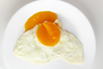 Egg background / chicken egg yolk is a major source of vitamins and minerals. It contains all of the egg's fat and cholesterol, and nearly half of the protein