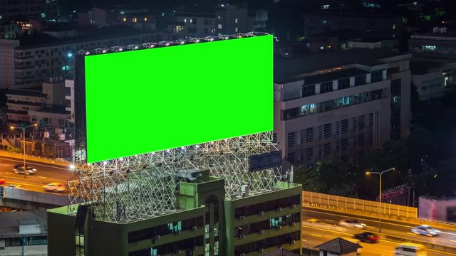 Advertising billboard green screen and traffic road.