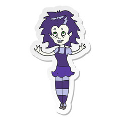 sticker of a cartoon vampire girl