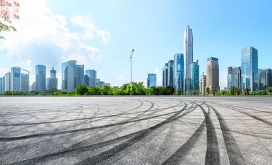 Fototapeta na wymiar Empty asphalt square ground and city skyline with buildings in Shenzhen