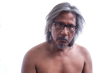 Portrait of homeless or senior man with glasses and no shirt feeling sad and depression in sadness face expression on white Background