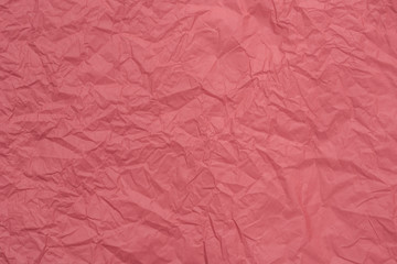 red creased tissue paper texture background