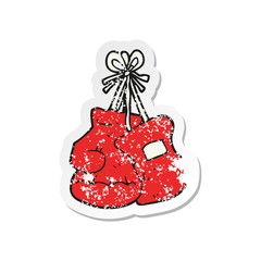 retro distressed sticker of a cartoon boxing gloves