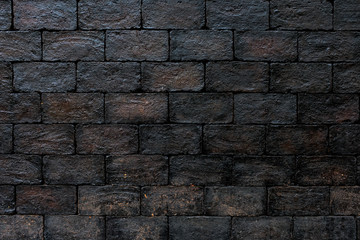 Shiny black brick metallic wall. Abstract pattern background