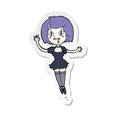 sticker of a cartoon happy vampire girl