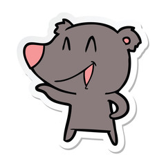 sticker of a laughing bear cartoon