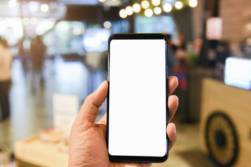 Man holding smart phone with bank moblie can be add your texts or others. at coffee shop