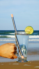 Drink using stainless steel straw
