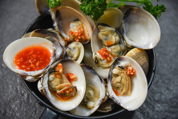 enamel venus shell cooking pan seafood plate with Shellfish Clams ocean gourmet dinner cooked