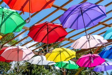 Naklejka na ściany i meble Street decorated with colored umbrellas, island Koh Phangan, Thailand