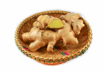 Fresh ginger root in the basket isolated on white background