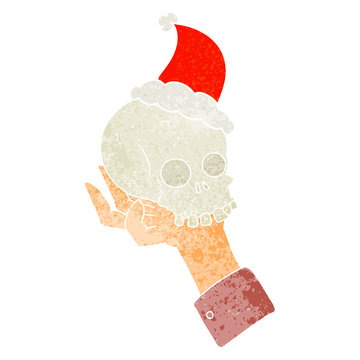 recommend clip art: retro cartoon of a hand holding skull wearing santa hat