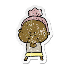distressed sticker of a cartoon happy old woman