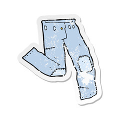 retro distressed sticker of a cartoon patched old jeans