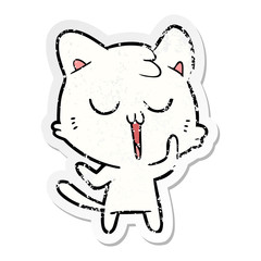 distressed sticker of a cute cartoon cat