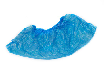 Fototapeta premium One medical blue shoe covers overshoes isolated on white background