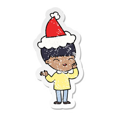 happy distressed sticker cartoon of a boy wearing santa hat