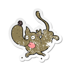 retro distressed sticker of a cartoon funny dog