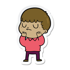 sticker of a cartoon grumpy boy