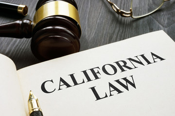California law on a dark wooden desk.