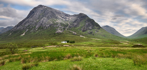 Panorama of white cottage on River Coupall valley with Stob Dhearg peak of Buachaille Etive Mor range at Glen Coe Scottish Highlands Scotland © Reimar
