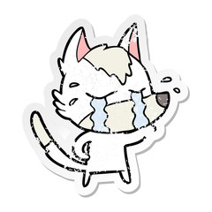 distressed sticker of a cartoon crying wolf