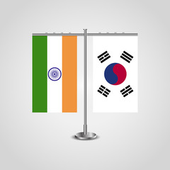 Table stand with flags of India and South Korea.Two flag. Flag pole. Symbolizing the cooperation between the two countries. Table flags