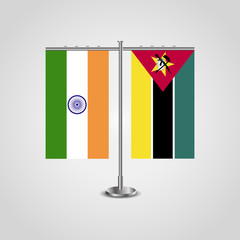Table stand with flags of India and Mozambique.Two flag. Flag pole. Symbolizing the cooperation between the two countries. Table flags