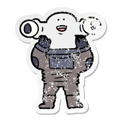 distressed sticker of a friendly cartoon alien