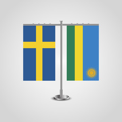 Table stand with flags of Sweden and Rwanda.Two flag. Flag pole. Symbolizing the cooperation between the two countries. Table flags