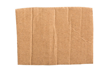 Brown corrugated cardboard torn piece isolated on white background.
