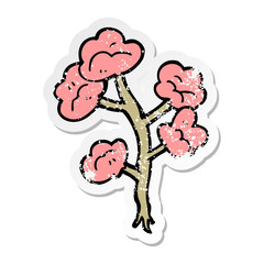 distressed sticker of a cartoon flowers