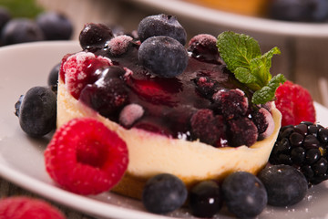 Cheesecakes with mixed berries. 