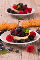 Cheesecakes with mixed berries. 