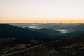 Sunrise in the mountains. Beautiful sunrise from a bird's flight.