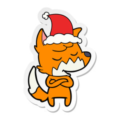friendly sticker cartoon of a fox wearing santa hat