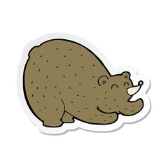 sticker of a cartoon stretching bear