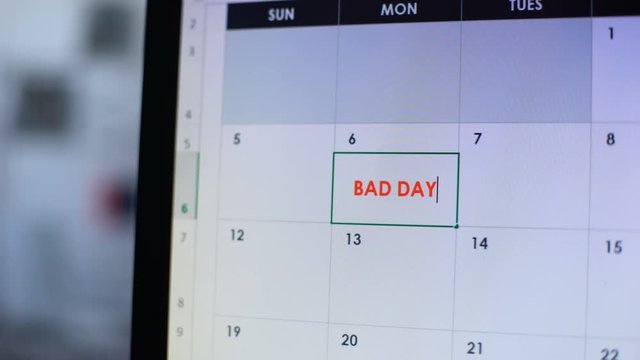 Bad day scheduled in online calendar, person disappointed with break-up, divorce