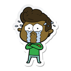 sticker of a cartoon crying man