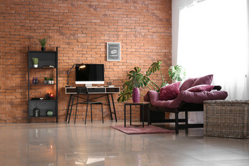 Interior of room with comfortable workplace