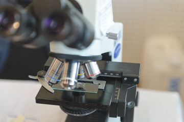 Optical microscope in laboratory. Medical equipment. Concept Science and Technology