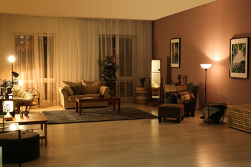 Interior of modern apartment in evening